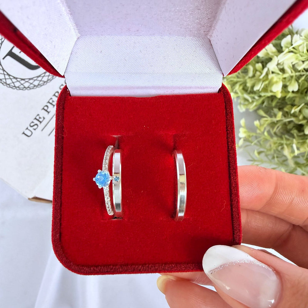 ALIANÇAS DE NAMORO EM PRATA 950 COM ANEL SOLITARIO AZUL CLARO
